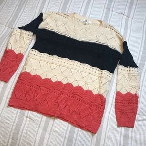 Multi color stripe sweater.